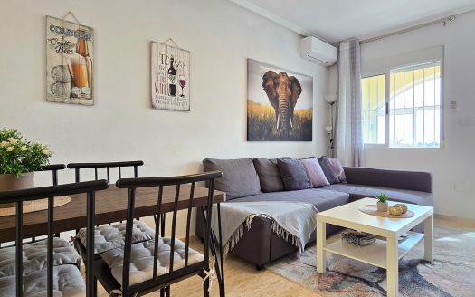 ** SOLD** Completely renovated south-facing townhouse with a large roof terrace in the center of La Florida.
