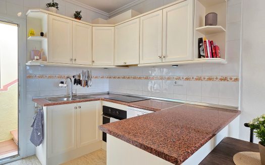 ** SOLD** Completely renovated south-facing townhouse with a large roof terrace in the center of La Florida.