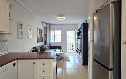 ** SOLD** Completely renovated south-facing townhouse with a large roof terrace in the center of La Florida.